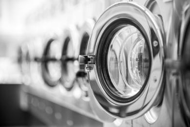 clothes washer’s door in a public launderette