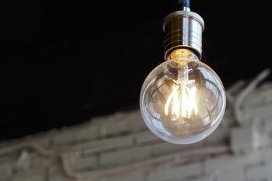 Incandescent lamp on a black background