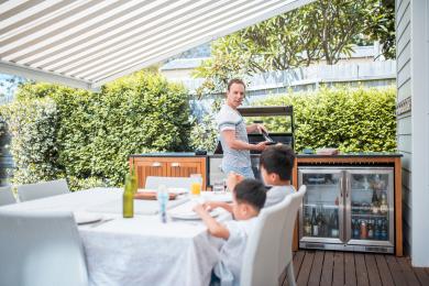 Family outdoor hospitality area with fridge