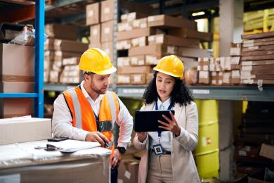 Workers checking regulated stock for compliance with obligations