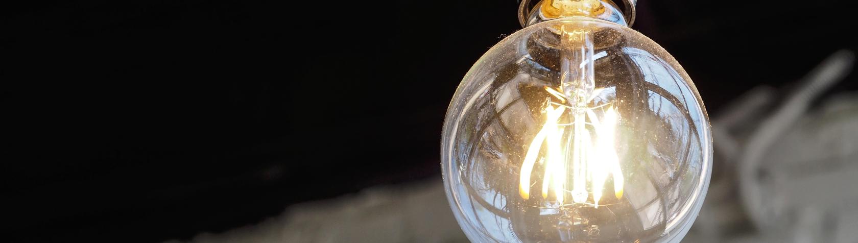 Incandescent lamp on a black background